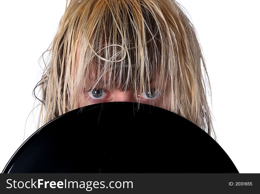 Girl with gramophone record, only eyes visible. Girl with gramophone record, only eyes visible