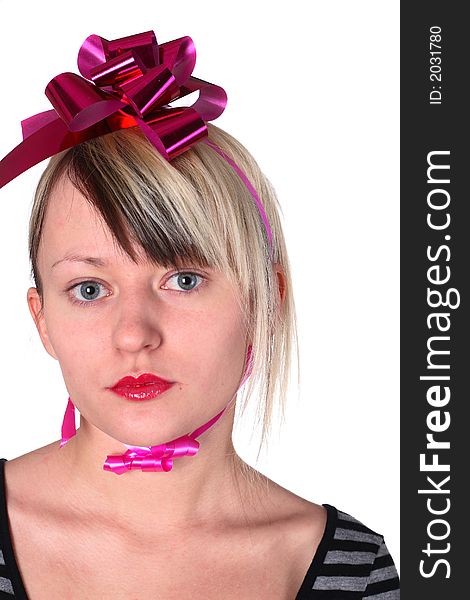 Girl with bow on head, looks serious