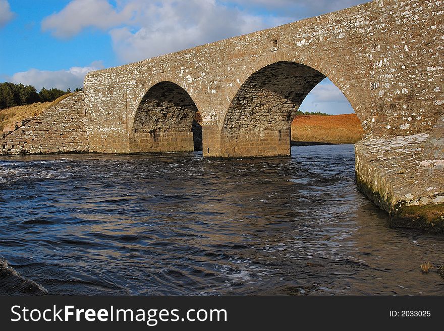 A traditionally built stone bridge over the river Thurso in Caithness, Scotland. This is one of the top UK slamon fishing rivers.