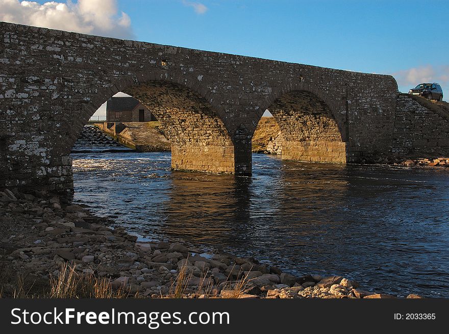 A traditionally built stone bridge over the river Thurso in Caithness, Scotland. This is one of the top UK slamon fishing rivers.