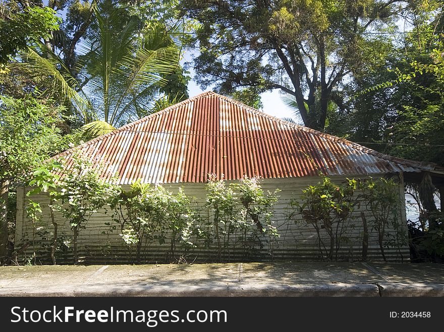 Native typical island house with tin room