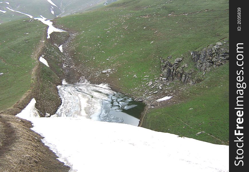 Snow sliding from mountains heights