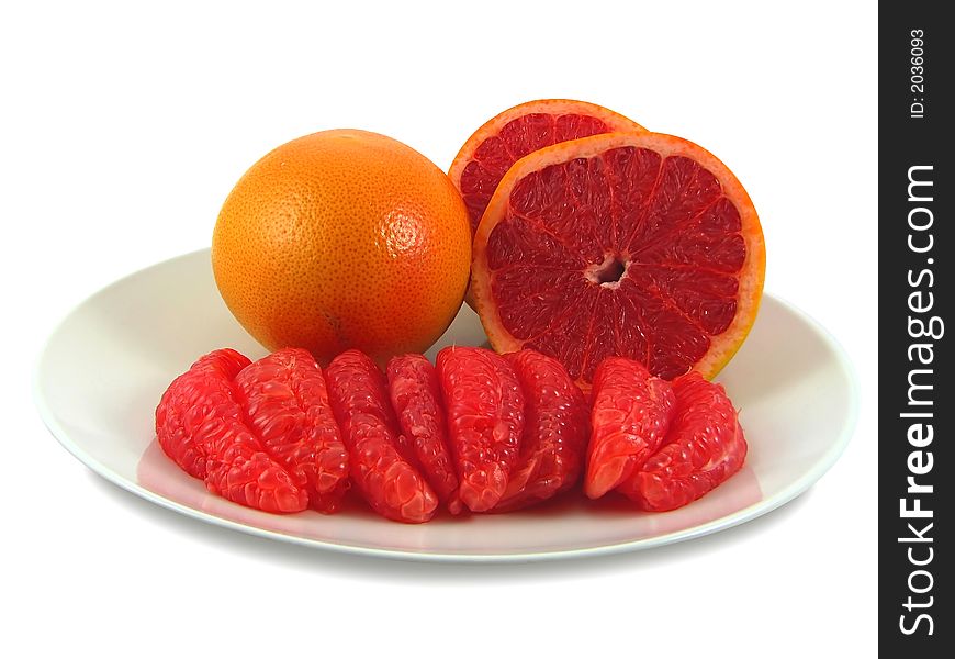 Red grapefruits, isolated on a white background. Red grapefruits, isolated on a white background.