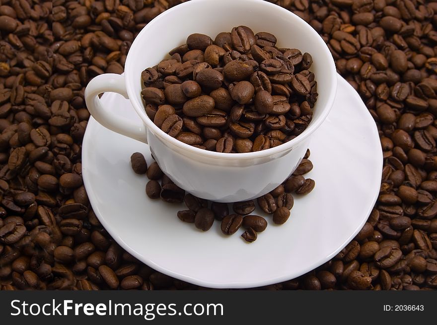 Cup with coffee beans