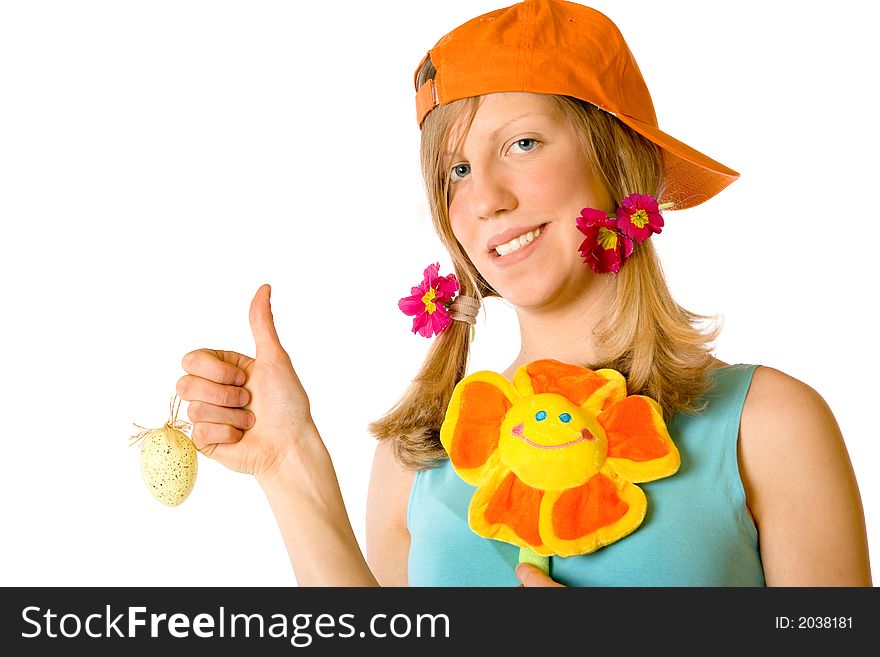 A beautiful girl with flowers and easter egg. A beautiful girl with flowers and easter egg.