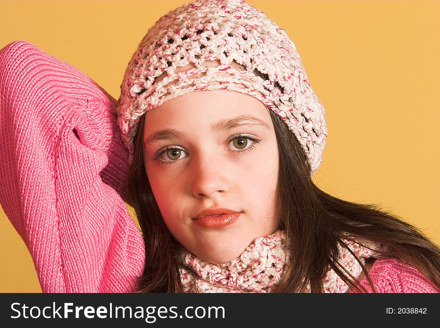 Portrait of pretty girl on yellow background