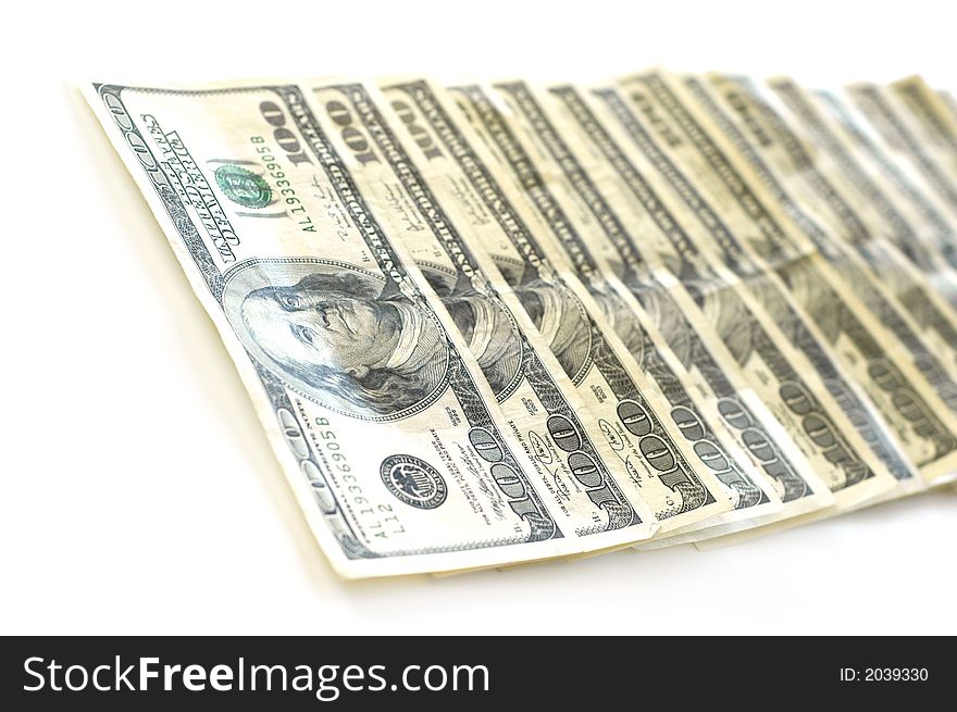 Closeup of hundred dollar bills isolated on white background. Closeup of hundred dollar bills isolated on white background