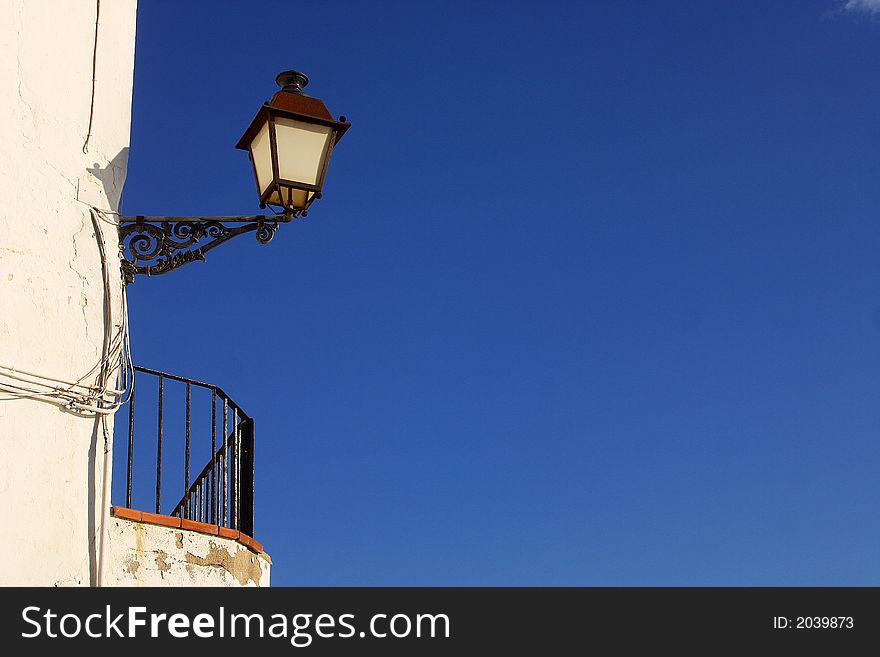 Old street light in the town of Cadaques, Catalonia, Spain, Europe. Old street light in the town of Cadaques, Catalonia, Spain, Europe
