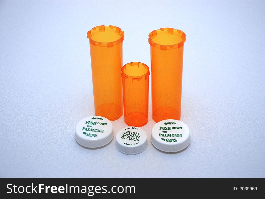 Three Empty Prescription Bottles manufactured for the pharmaceutical industry.