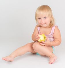 Adorable Toddler Girl Eat Green Fresh Apple Stock Photo
