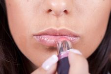Woman Applying Lipstick Stock Photo Woman Applying Lipstick Stock Photo