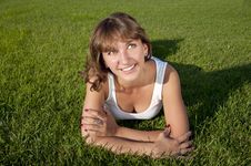 Beautiful Young Woman Smiling On Grass Field Stock Images Beautiful Young Woman Smiling On Grass Field Stock Images