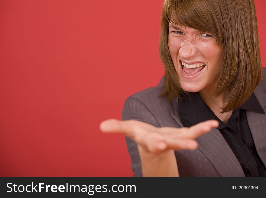Upset business woman over red background. Upset business woman over red background