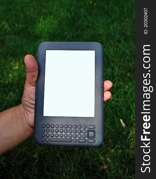 Digital book reader in hand