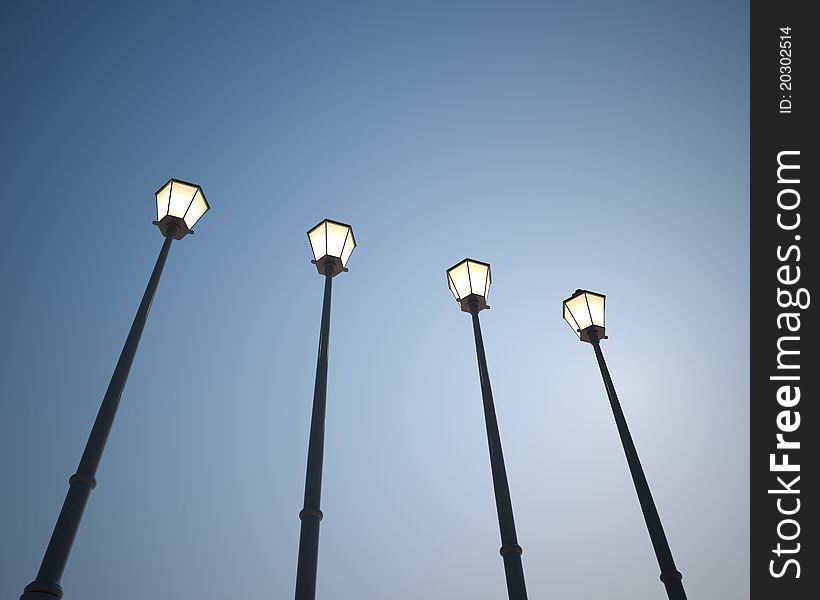 Four lanterns against the blue sky