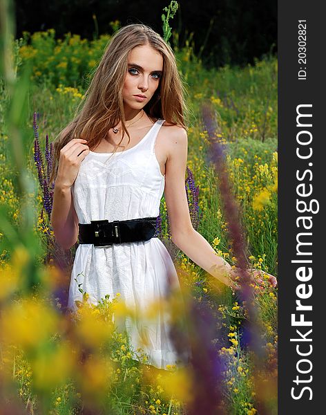 Young beautifull girl at the meadow. Young beautifull girl at the meadow