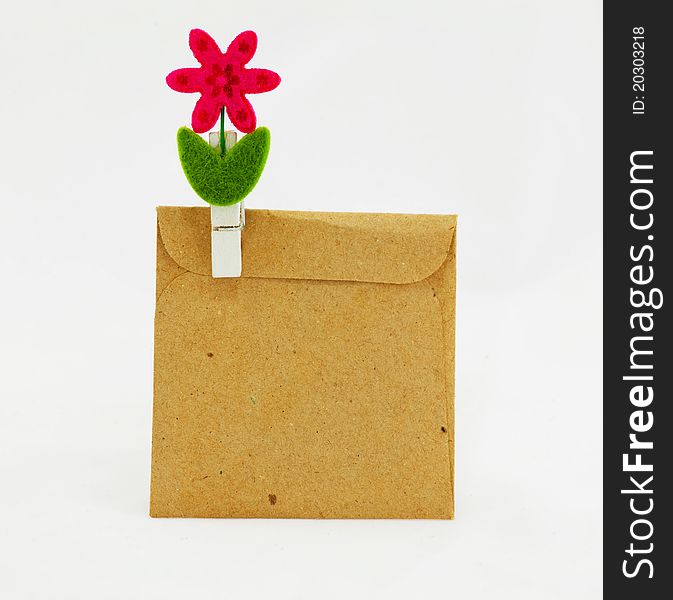 Brown bag with clip on white background