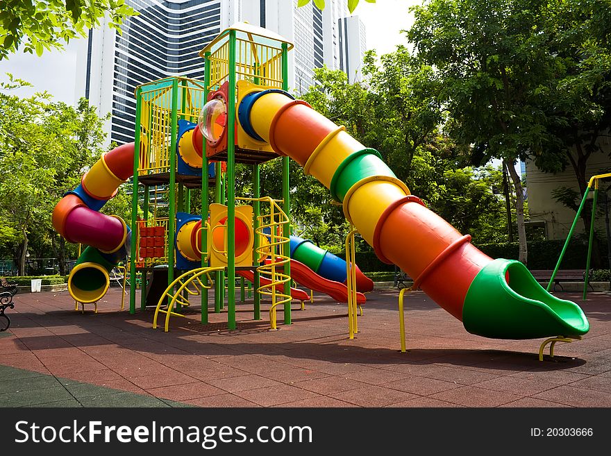 Playground in the park near Condominium in the city