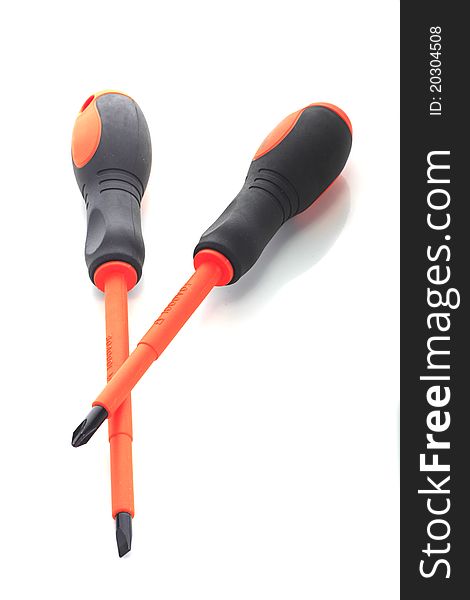 Two electrical screw driver, type flat and philip. orange colour with hand grip, colour black. Isolated white background. Two electrical screw driver, type flat and philip. orange colour with hand grip, colour black. Isolated white background.