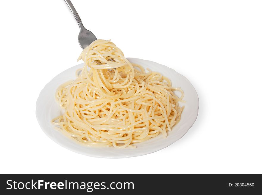 Spaghetti serve on white plate. Spaghetti serve on white plate