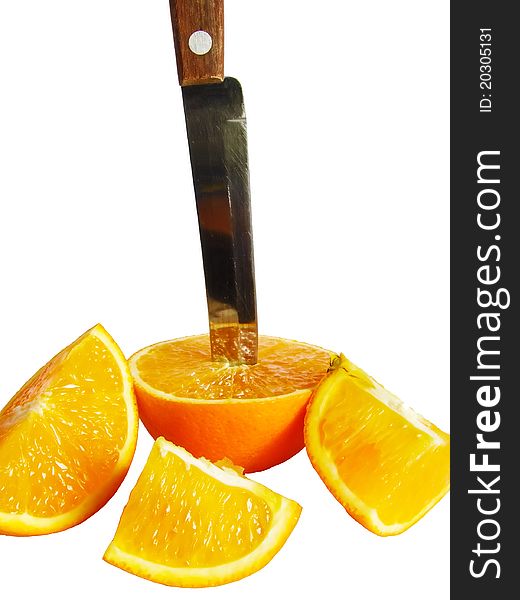 Fresh juicy orange knifed on segments on a white background