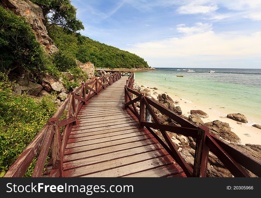 Wooden Bridge on Beautiful turquoise seascape and white sandy beach of Koh Lan, Pattaya, Thailand. Wooden Bridge on Beautiful turquoise seascape and white sandy beach of Koh Lan, Pattaya, Thailand