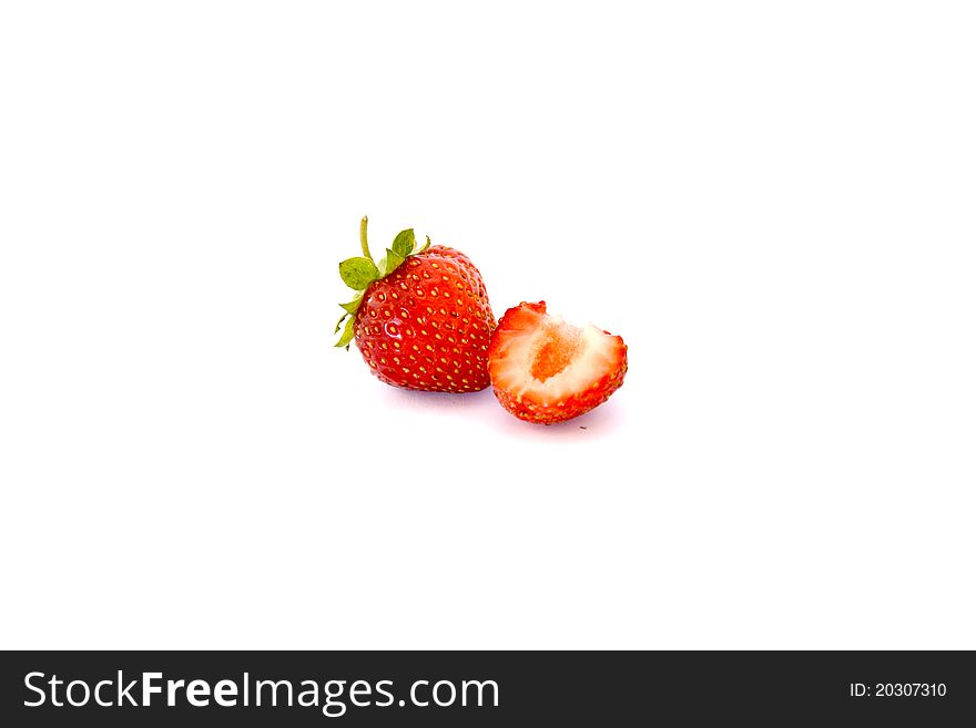 The red strawberry on white