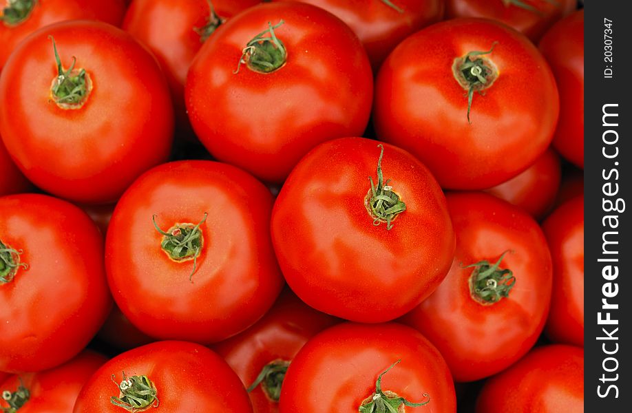 Background of fresh ripe red tomatoes