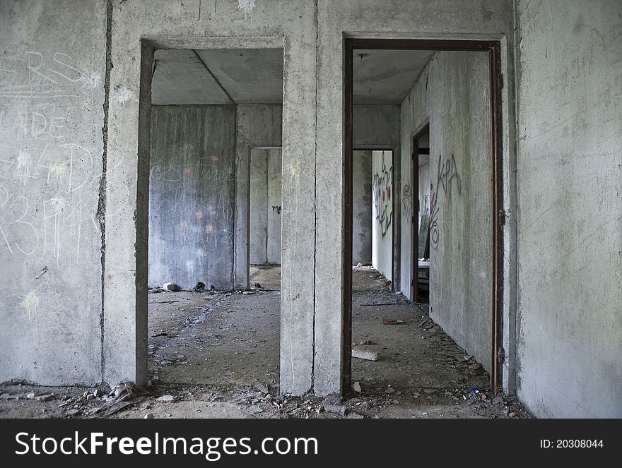 Inside gray abandoned concrete house