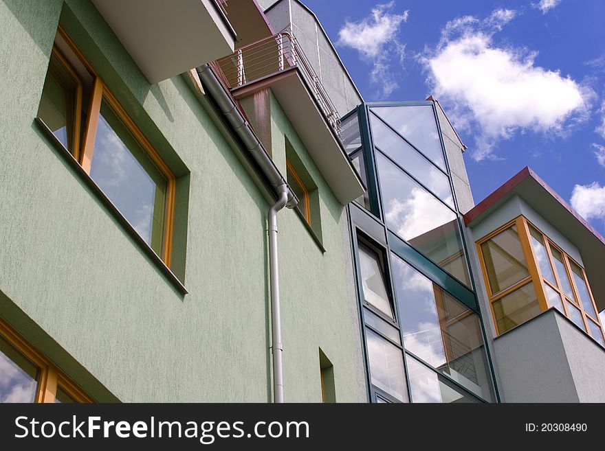 Modern house complex under blue sky. Modern house complex under blue sky