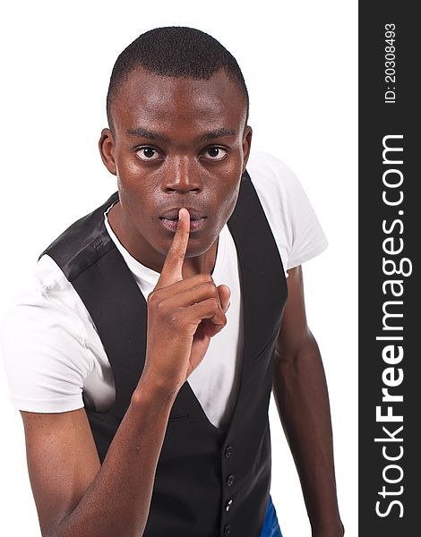 Young and beautiful black man doing silence sign