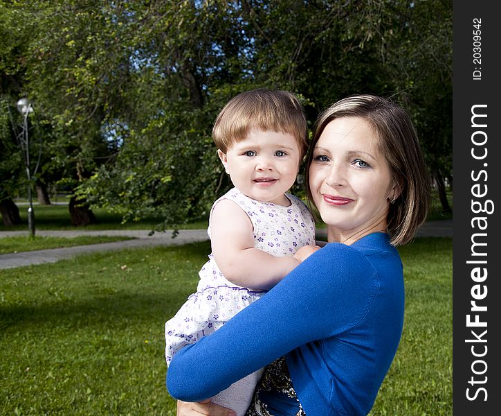 Mom And Baby In Park