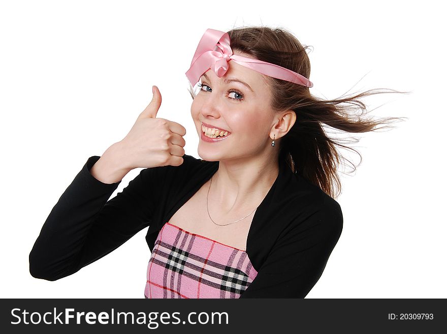 Portrait of an attractive young female with thumbs up.