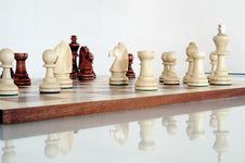 Chess Pieces On Wood Board Royalty Free Stock Photography Chess Pieces On Wood Board Royalty Free Stock Photography