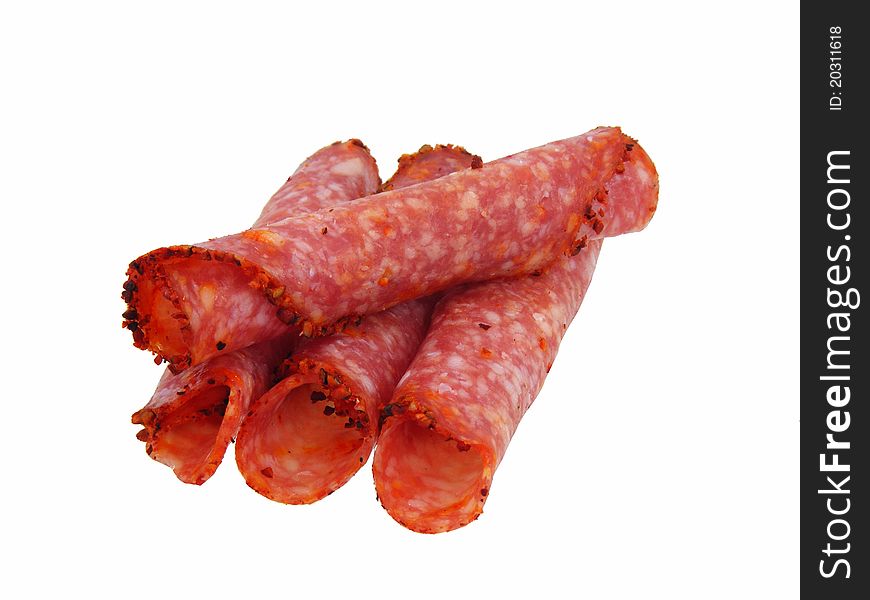 Salami rolls on a white background