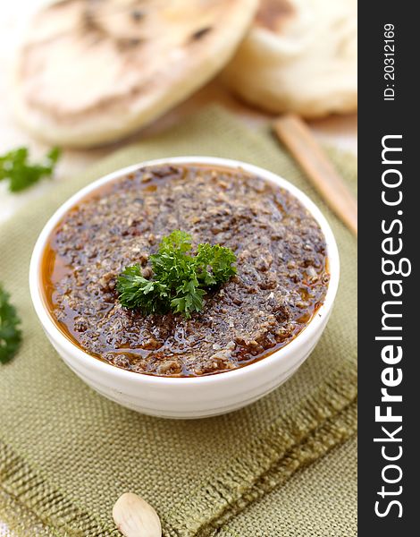 Delicious homemade mushroom pesto decorated with parsley