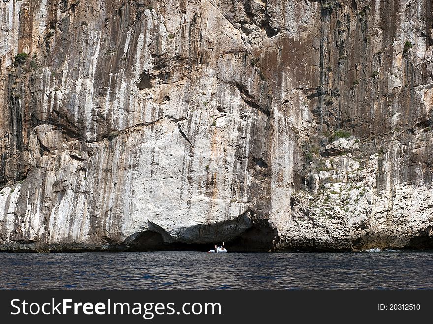 Boat close to mountain wall and The Mediterranean Sea on Majorca, Spain. Boat close to mountain wall and The Mediterranean Sea on Majorca, Spain.