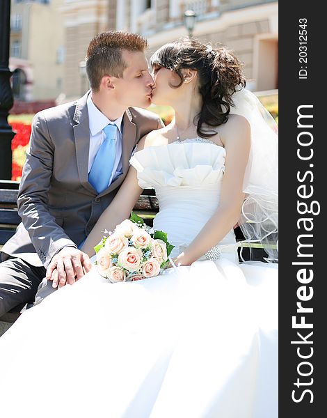 The bride and groom outdoors