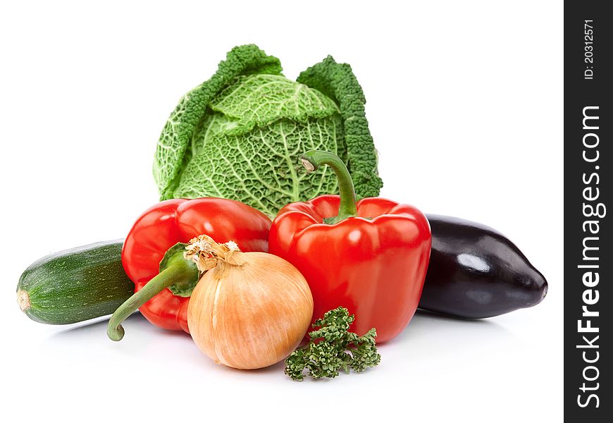 Composition with variety of raw fresh organic vegetables. Isolated over white background. Composition with variety of raw fresh organic vegetables. Isolated over white background