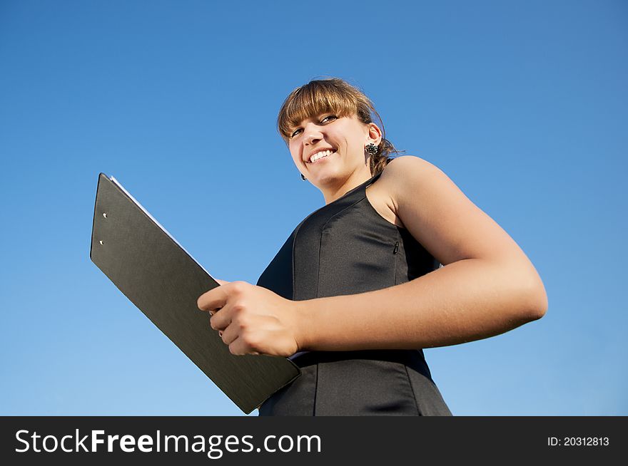 Business woman  tablet, background blue sky, see to tablet. Business woman  tablet, background blue sky, see to tablet