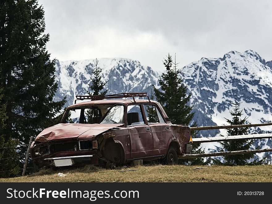 Old Russian car Lada parked on field, mountain Durmitor, Montenegro. Old Russian car Lada parked on field, mountain Durmitor, Montenegro