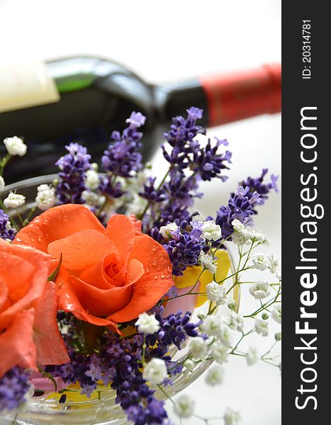 Rose and lavender with red wine bottle. Rose and lavender with red wine bottle