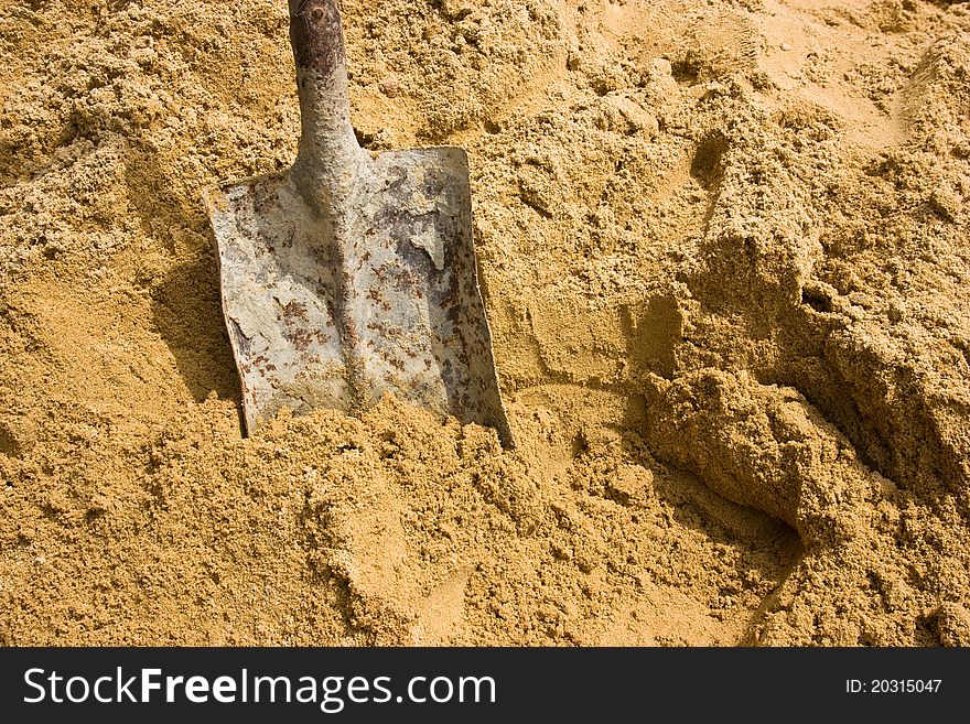 Sand spade by worker are working  at site work