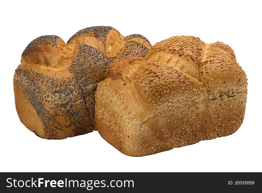Two loaves of  fresh wheat  bread with poppy and sesame seeds, isolated on white background.
