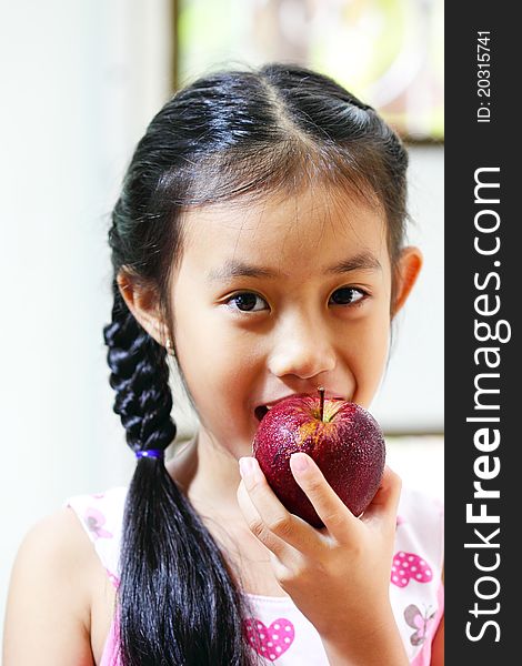 Young Girl With Apple