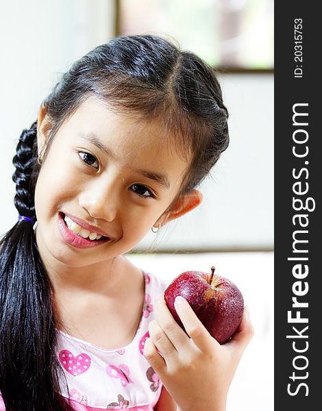 Young Girl With Apple