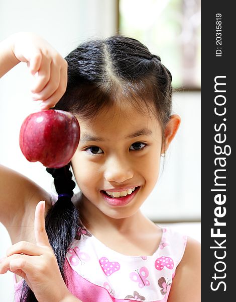 Young Girl With Apple