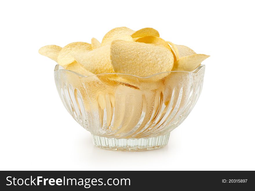 Delicious potato chips in white bowl