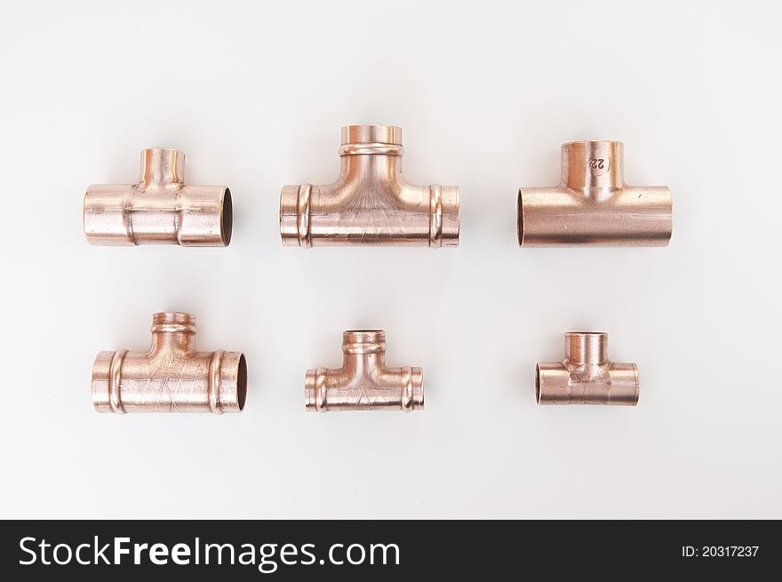 Different types of copper plumbing soldered tee fittings. Different types of copper plumbing soldered tee fittings