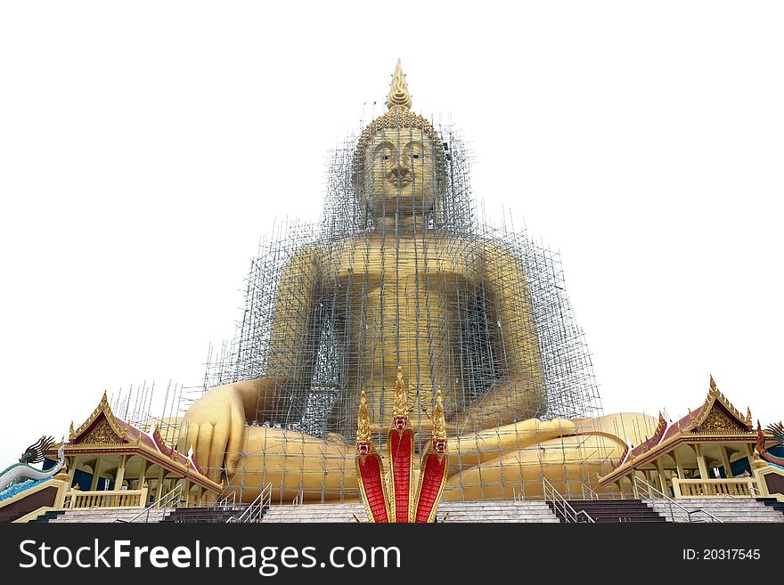 Biggest golden buddha statue image outdoor in Temple Thailand under renovate